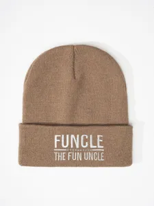 Close up of brown knit beanie featuring white embroidered funny uncle text detail on the cuff.