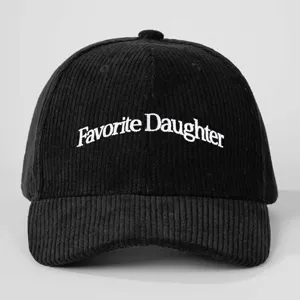 Black corduroy baseball cap featuring white Favorite Daughter embroidery, stylish outdoor hat.