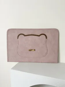 Cute pink leather laptop sleeve with bear design and gold tag for 13 14 15 inch notebooks.