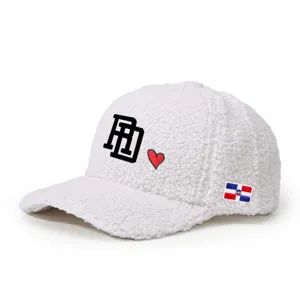 White sherpa baseball cap featuring embroidered RD letters, a red heart, and a side flag patch.