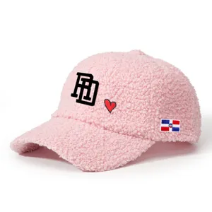 Pink sherpa baseball cap featuring embroidered RD letters, red heart, and national flag patch.