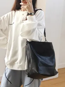 Minimalist black PU leather shoulder bag with chain strap, large capacity daily tote for women