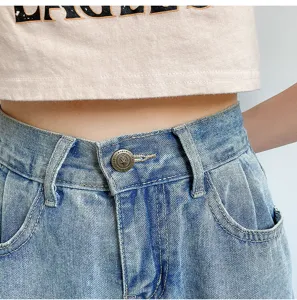 Women denim jeans waist detail view high waist light blue casual pants with metal button