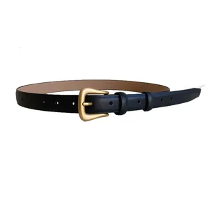 Ceinture femme en cuir noir avec boucle dorée irrégulière pour jeans tendance chic