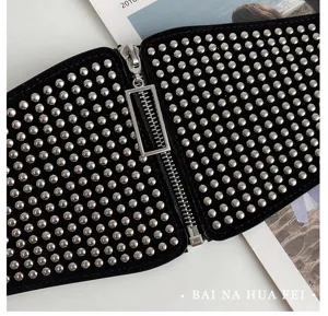 Punk style wide black waist belt with silver metal studs and zipper detail for women