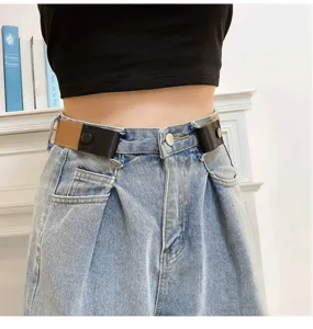 Close-up detail of the buckle-free lazy waist belt worn on blue jeans, showing the elastic design.