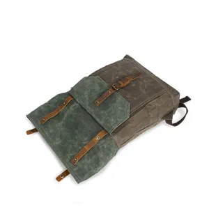 Vintage canvas backpack for men, large capacity travel school bag with leather straps.