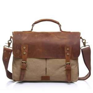 Vintage men's canvas and leather messenger bag retro crossbody briefcase for laptop commute.