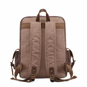 Vintage canvas leather backpack for men, casual retro travel rucksack and laptop bag.