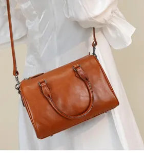 Brown genuine leather Boston crossbody bag, stylish vintage shoulder handbag for modern women.
