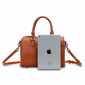 Vintage vegetable-tanned leather Boston handbag, classic brown women's crossbody bag.