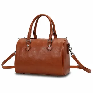 Vintage genuine leather Boston bag for women, stylish crossbody handbag with top handle.