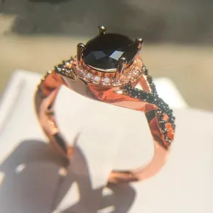 Anello vintage con zircone nero da donna, elegante gioiello moda placcato oro rosa.
