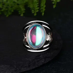 Vintage böhmischer Stil ovaler schillernder Edelstein Ring für Damen mit breitem Silberband.