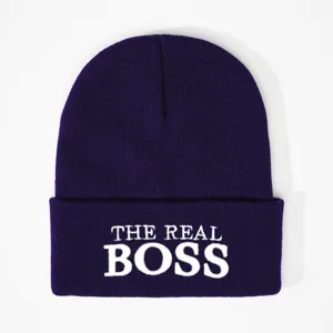 Purple knitted winter beanie hat featuring stylish white embroidery text design for men.