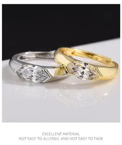 Anello dettaglio zircone marquise con design geometrico unico per coppie di grande stile.