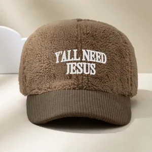 Brown faux-sherpa baseball cap with corduroy brim and embroidered Yall Need Jesus text detail