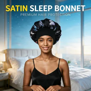 Satin sleep bonnet with butterfly print and wide elastic band for comfortable hair protection.