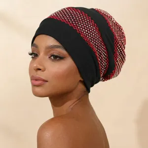 Rhinestone turban cap detail, elegant black head wrap with shimmering red crystals for women