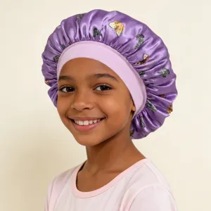 Kids satin sleep cap with wide elastic band and lovely butterfly print for hair care protection.