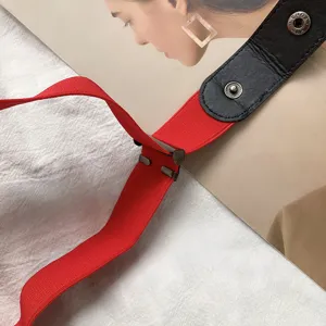 Red elastic lazy belt with black leather snap button design, comfortable and punch free for daily wear.