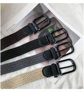 Detail view of woven braided elastic belts with pin buckle, multiple colors available.