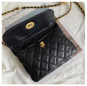 Classic black quilted shoulder bag with gold chain strap and elegant flap design for women.