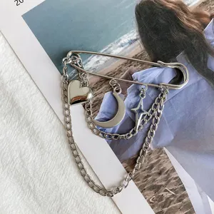Fashion silver color safety pin brooch with multi-layer chains, heart, moon and star charms.