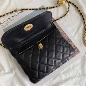 Classic black quilted leather chain crossbody bag with elegant gold hardware and chic design.