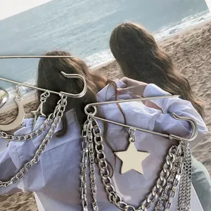 Fashion silver chain safety pin brooch with star and moon charms for women clothing styling.