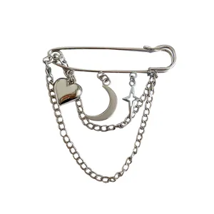 Silver safety pin brooch with heart chain charms, fashion waist adjuster clothing accessory.