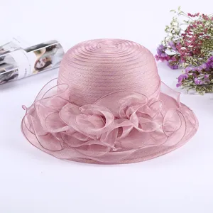 Close-up of elegant organza lace sun hat detail, beautiful ruffle brim and texture design.