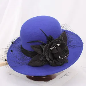 Elegant blue women's felt fedora hat with black mesh veil and floral pearl decor chic.