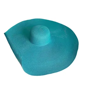 Brede rand turquoise strohoed voor vrouwen, grote strand zonnehoed voor de zomer en vakantie.