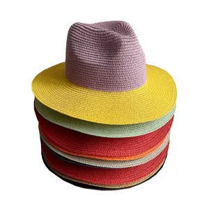 Colorful stacked straw fedora hats for women, perfect summer beach sun protection and casual wear.