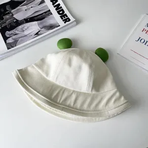 Cute frog bucket hat with green fuzzy eyes, stylish summer sun protection accessory for daily wear.