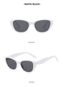 Occhiali da sole bianchi cat eye alla moda, montatura spessa protezione UV chic.