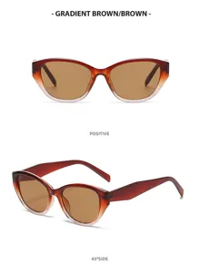 Occhiali da sole cat eye marroni sfumati alla moda da donna con protezione UV stile vintage.