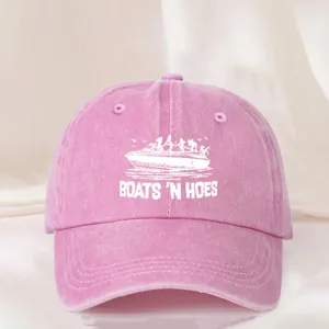 Pink washed cotton baseball cap with boat graphic and custom text for casual outdoor wear