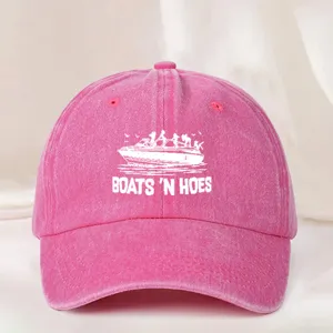 Pink washed cotton baseball cap with boat graphic and letter print for outdoor wear.
