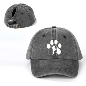 Detailed view of the distressed grey ponytail baseball cap with cute pet paw print design.