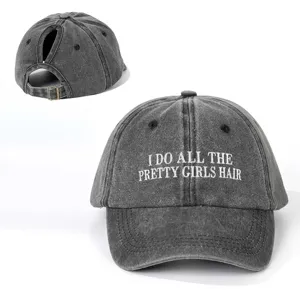 Close-up detail of the vintage washed grey ponytail baseball cap with front embroidery.