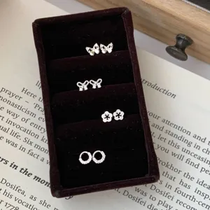 Set boucles d'oreilles clous nœud et fleur en argent S925, style vintage élégant.