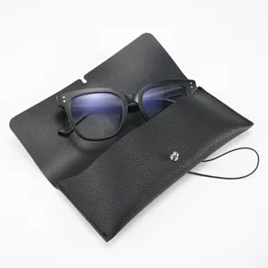 Black leather glasses case with blue light blocking glasses set, portable protective storage box.