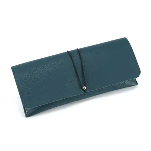 Stylish dark teal leather glasses case with elastic band closure for dustproof protection.