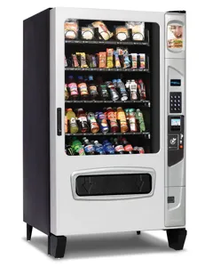Distributeur automatique commercial de snacks et de boissons avec vitrine et clavier numérique.