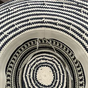 Detailed view of women black and white geometric straw hat summer beach sun protection fedora