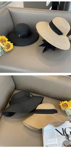Elegante cappello di paglia a tesa larga stile Hepburn nastro nero donna estate spiaggia