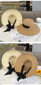 Vista dettagliata di cappelli di paglia a tesa larga con nastro nero, perfetti per la spiaggia.