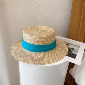 Retro British flat-top straw hat for women, summer sun protection beach hat with blue ribbon.